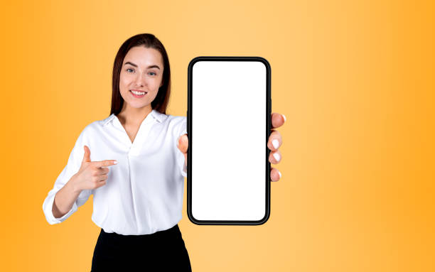 istock Businesswoman finger point with phone, mockup screen 1401173743