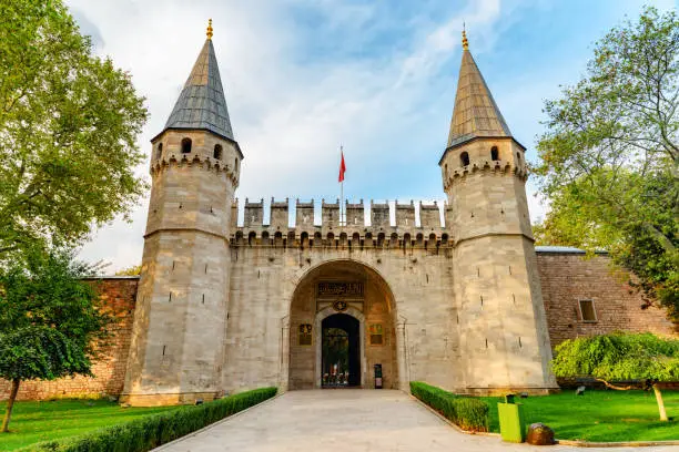 Awesome view of the Gate of Salutation (the Middle Gate) leading to the Second Courtyard of Topkapi Palace in Istanbul, Turkey. The Topkapi Palace is a popular tourist attraction in Turkey.