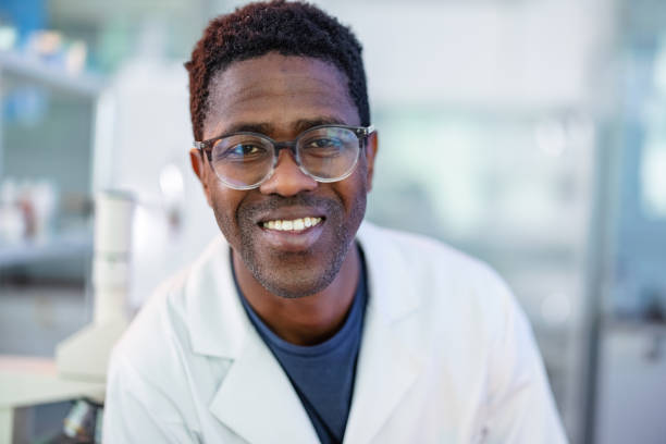 istock Young African-American Scientist In Laboratory 1401178906