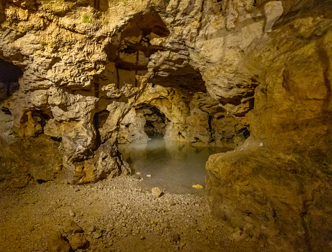 Scenic view of underground cave over lake