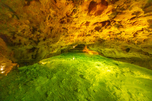 Scenic view of underground cave and lake