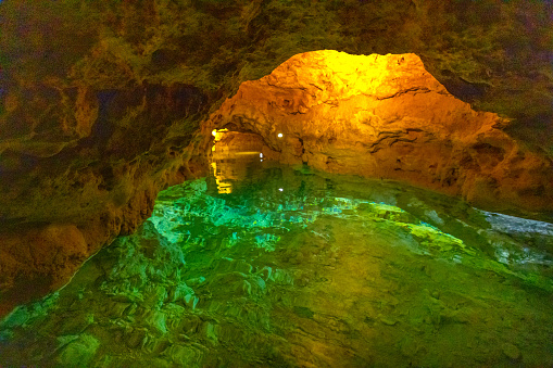 Amazing lava tunnel that fills with water from the rains and sea level. It is located in Lanzarote.