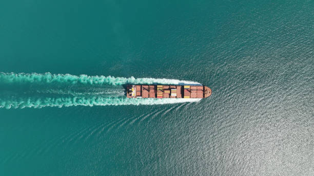 istock Aerial view of a heavy loaded container cargo vessel 1401180686