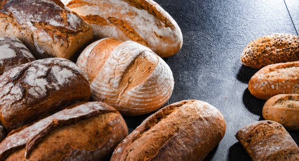 istock Assorted bakery products including loafs of bread and rolls 1401182128