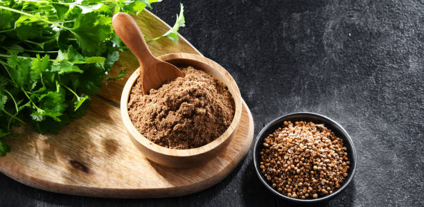 istock Ground coriander, its dried seeds and fresh leaves 1401182341