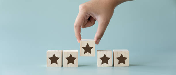 istock Customer review concept picking five stars for great service experience. 1401185376