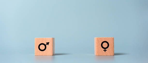 istock Man and Woman equality concept using wooden blocks 1401185389