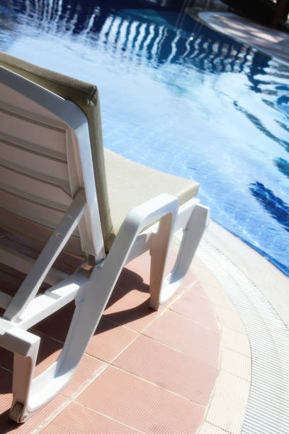 istock Lounger by the pool 1401187723