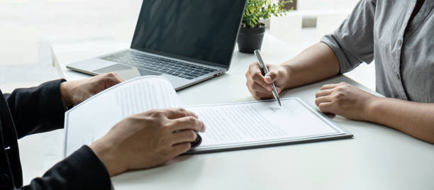 istock Business committee or interviewer consider and asking about profile of candidate, consider resume conducting a job and conversation listen to answers to thought attitude 1401188141