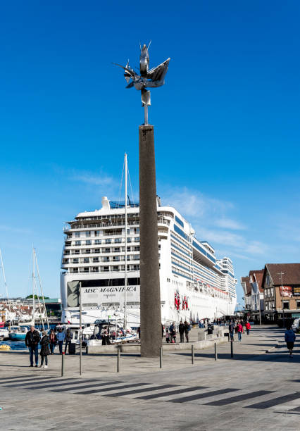 Large cruise ship at port next to main city square, Stavanger, Norway, 17 May 2018