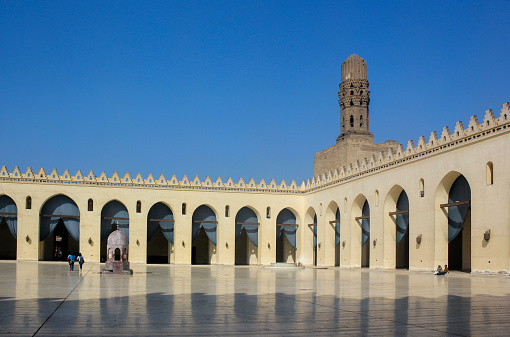 Minaret of public historic Al Hakim Mosque known as The Enlightened Mosque, located in Moez Street