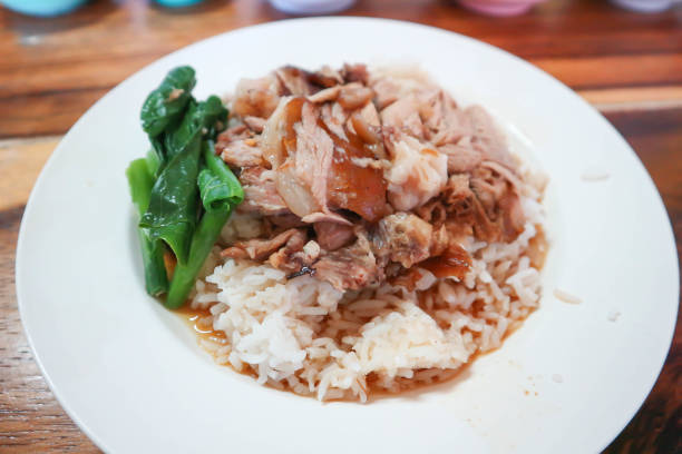 istock pork and rice or stewed pork or boiled pork, fresh ham on rice