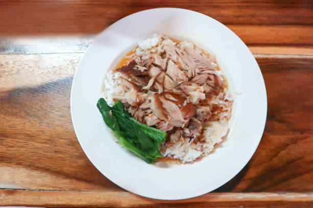 istock pork and rice or stewed pork or boiled pork, fresh ham on rice