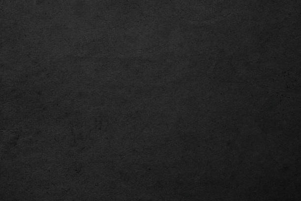 black background, paper texture similar to concrete wall