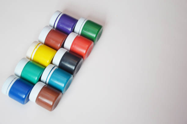 istock Jars with colored gouache for creativity. A set of white, blue, red paints. Drawing, learning, hobby. 1401197434