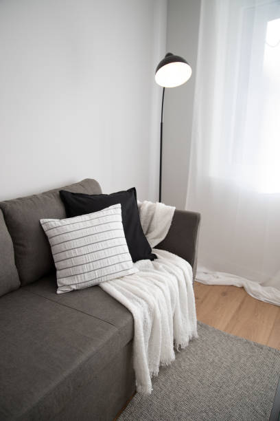 istock lamp and sofa in apartment. vertical. 1401200982