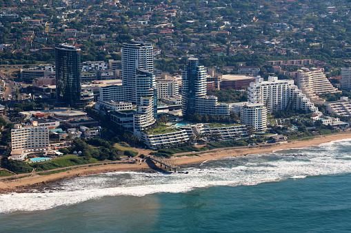 Umhlanga Rocks, KwaZulu-Natal, South Africa, June 5, 2022. Aerial photo of Umhlanga Rocks and surrounding areas with The Pearls in the foreground on a warm clear Spring day.