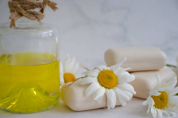 istock natural soap, chamomile flower on a light background 1401208087