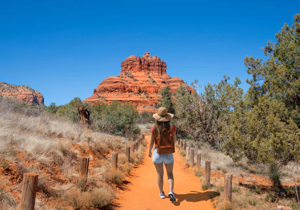 istock Girl on spring hiking trip in red mountains. 1401209159