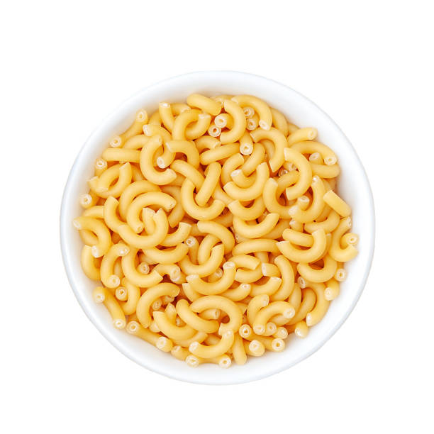 istock Italian pasta in white cup isolated on white background. View from above 1401211164