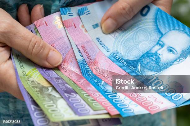 Woman Holding Chilean Money Various Peso Banknotes House Budget Concept Stock Photo - Download Image Now