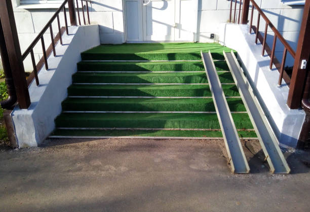istock Porch with green steps and rails for strollers 1401215480
