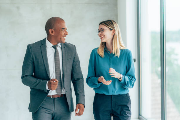 istock Two cheerful business people 1401215887