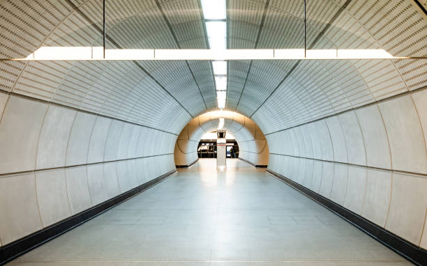 A passageway linking platforms at Tottenham Court Road station on London's newest undergound line, the Elizabeth Line, which partially opened in May 2022 after being delayed for some years.