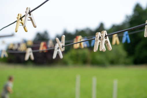 Colourful clips on the clotheslines.
