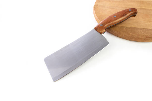 istock Chef's kitchen knife lay on wooden board and white background. Chef, restaurant or kitchen concept. 1401216701