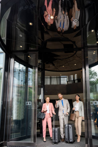 istock Young business colleagues leaving a hotel 1401218067
