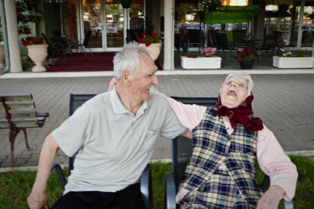 Senior couple spending time together in their back yard.