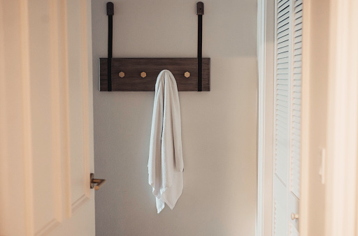 Towel hangs from a towel rack