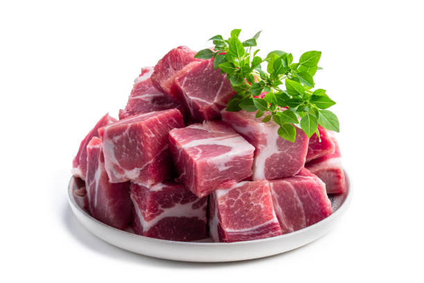 istock Fresh raw pork in ceramic plate isolated on white 1401232921