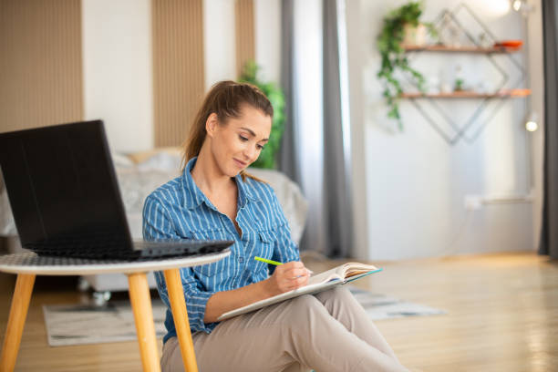 istock Young businesswoman working from 1401237800