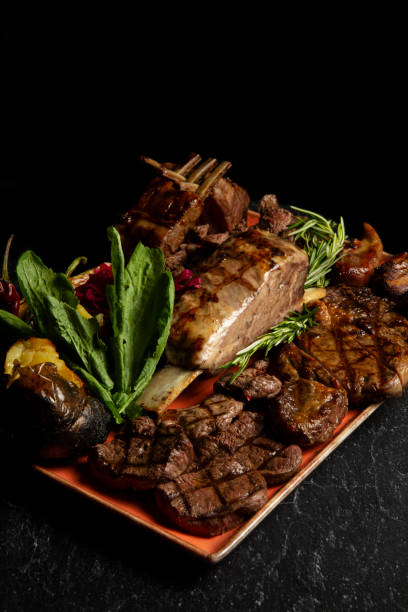 BBQ meat plate. Assorted delicious grilled meat on plate.