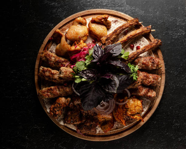 BBQ meat plate. Assorted delicious grilled meat on plate.