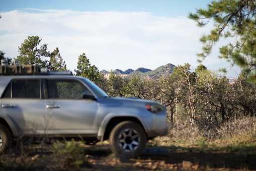 Overland campsite with the Seven Sisters Buttes in the background, focus on mountain