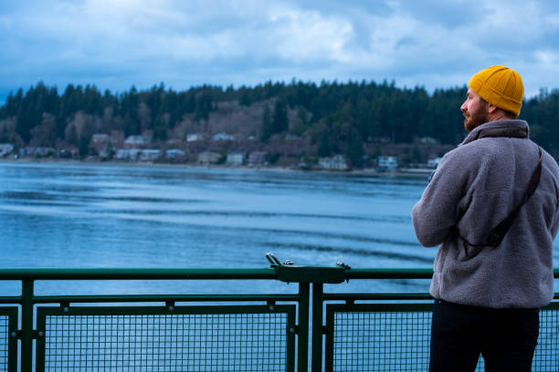istock Photographer on the Ferry 1401241230