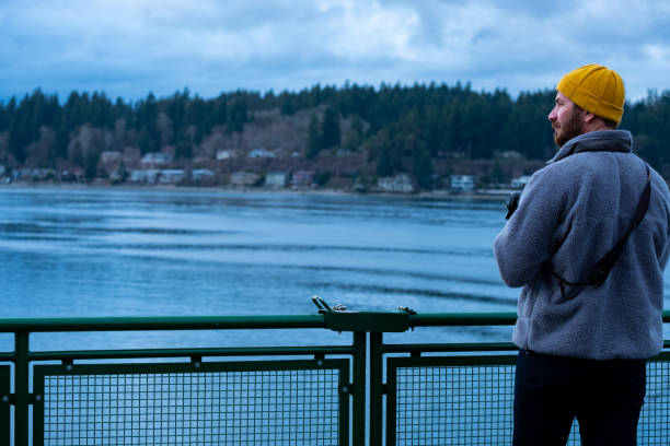 istock Photographer on the Ferry 1401241233