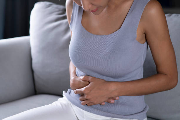 istock Woman having a stomach ache. 1401241660