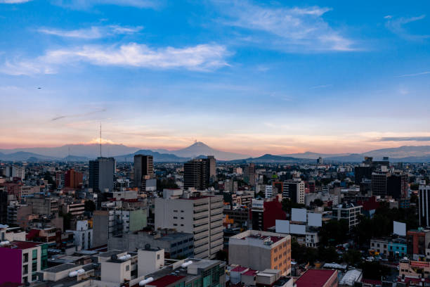 istock Mexico City downtown with volcanoes 1401243265