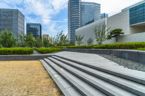 istock empty pavement and modern buildings in city 1401247075