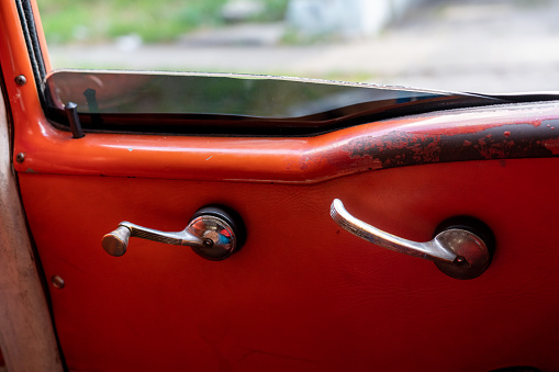 Interior handle of an old car in Havana. Cuba.