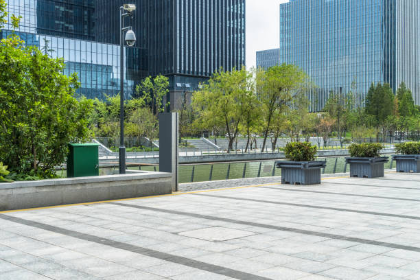 istock modern buildings and empty pavement in china 1401252869