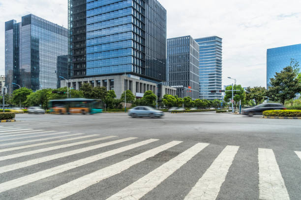 istock empty road with zebra crossing and skyscrapers in modern city 1401253676
