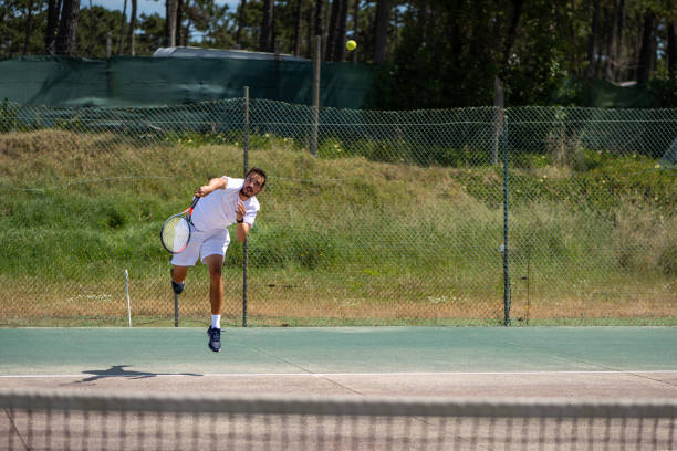 istock Tennis player performing a service 1401256447