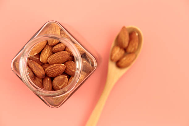 istock Almond nuts in a jar on the table 1401261124