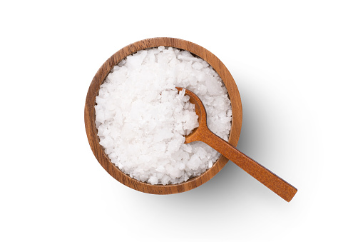 Natural sea salt in wooden bowl