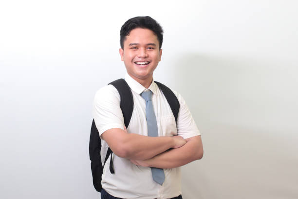 istock Indonesian senior high school student smiling and looking at camera 1401268983